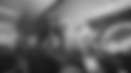 Tremaine Edmunds hands out shoes and school supplies at the Boys and Girls Club of Buffalo, Masten Club House, on August 15, 2022. Photo by Ben Green