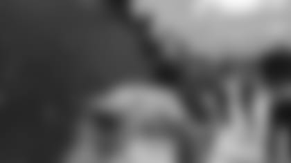 Buffalo Bills fans celebrate with Dion Dawkins, shoveling snow on them after the LeSean McCoy game winning overtime touchdown run in the snow against the Indianapolis Colts at New Era Field on December 10, 2017. Photo by Craig Melvin.