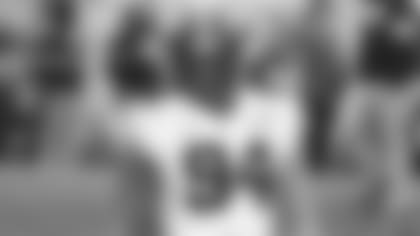 **A.J. Epenesa, DE, Iowa wore #94 in college.**
Iowa defensive end A.J. Epenesa (94) warms up before a game against Northwestern an NCAA college football game, Saturday, Oct. 26, 2019, in Evanston, Ill. (AP Photo/David Banks)