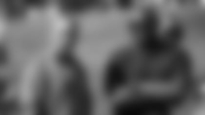 Former Broncos head coach Mike Shanahan talks with ESPN reporter Anthony "Booger" McFarland at a joint practice with the San Francisco 49ers on the 20th day of training camp on August 17, 2019.