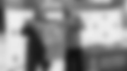 Bradley Chubb poses with his high school football coach, Phillip Ironside, at Hillgrove High School in 2018.