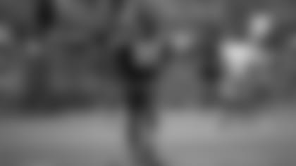 Los Angeles Chargers linebacker D'Juan Hines walks off the field after the team's NFL football practice, Sunday, July 29, 2018, in Costa Mesa, Calif. (AP Photo/Jae C. Hong)