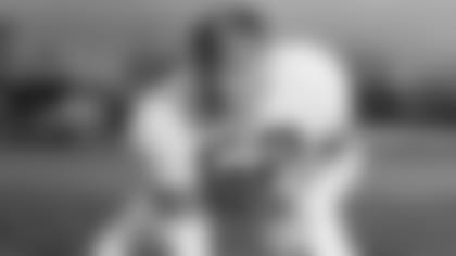 FILE - In this Jan. 5, 1956 file photo, Cleveland Browns Hall of Fame center Frank "Gunner" Gatski poses in Cleveland, Ohio. Gatski's family has the late football star's Hall of Fame ring back, just in time for the holidays. (AP Photo/file)