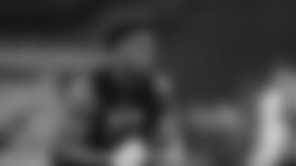 Wisconsin running back Jonathan Taylor runs a drill at the NFL football scouting combine in Indianapolis, Friday, Feb. 28, 2020. (AP Photo/Michael Conroy)