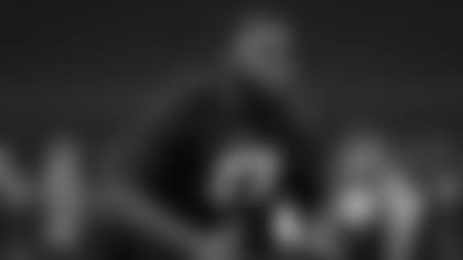 Georgia offensive lineman Andrew Thomas runs a drill at the NFL football scouting combine in Indianapolis, Friday, Feb. 28, 2020. (AP Photo/Charlie Neibergall)