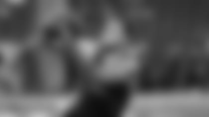 Texas A&M University wide receiver Mike Evans catches footballs during the gauntlet drill at the 2014 NFL Scouting Combine at Lucas Oil Stadium in Indianapolis, on February 23, 2014. (AP Photo/Ben Liebenberg)