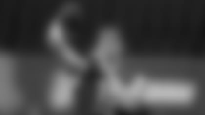 Utah State quarterback Jordan Love runs a drill at the NFL football scouting combine in Indianapolis, Thursday, Feb. 27, 2020. (AP Photo/Charlie Neibergall)