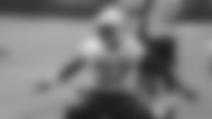 Indianapolis Colts safety Chris Cooper runs a drill as the team practiced at the NFL football team's practice facility in Indianapolis, Friday, May 11, 2018. (AP Photo/Michael Conroy)