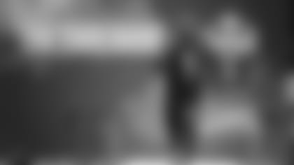 LSU linebacker Devin White runs the 40-yard dash at the NFL football scouting combine in Indianapolis, Sunday, March 3, 2019. (AP Photo/Michael Conroy)