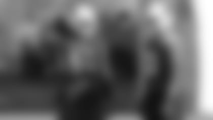 New Cardinals tackle Joe Barksdale (60) talks with guard Oday Aboushi during practice Friday.