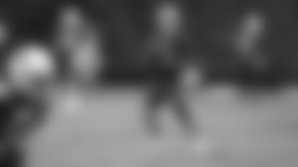 Quarterback Sam Bradford looks to throw a pass Wednesday at practice.