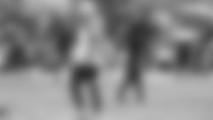 Jonathan Gannon uses a bullhorn to communicate at an OTA.