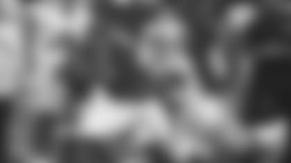 RB Chase Edmonds (left) is wrapped up by Cowboys cornerback Jourdan Lewis.