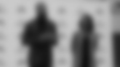 Larry Fitzgerald and former United States Secretary of State Condoleezza Rice speaking at a Boys & Girls Club in 2019.