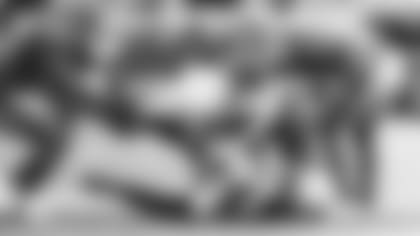 Linebacker Joe Walker recovers a Lions onside kick early in Sunday's loss in Detroit.