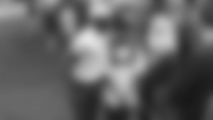 CB Patrick Peterson poses for a photo with a fan on Wednesday at the Waste Management Phoenix Open