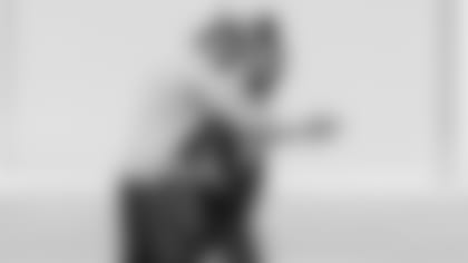 Wide receiver Marquise "Hollywood" Brown gets instruction from wide receivers coach Shawn Jefferson earlier this offseason.