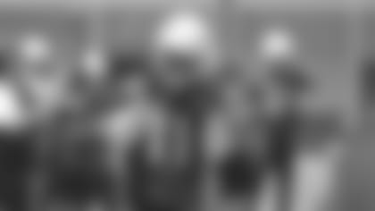 Wide receiver Larry Fitzgerald claps and smiles after a play during a recent OTA.