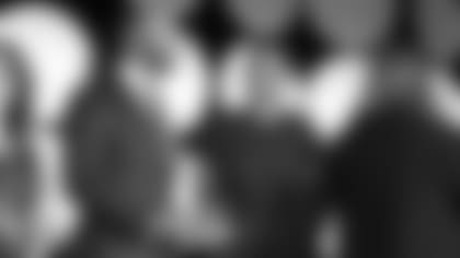 Larry Fitzgerald talks to fellow Arizona Sports Hall of Fame inductee Jennifer Gillom Tuesday night at the Chateau Luxe.