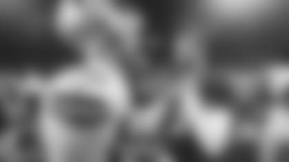 Cardinals quarterback Josh Rosen (right) talks with Cowboys tight end Dalton Schultz Sunday after Arizona's win.