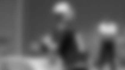 Quarterback Sam Bradford looks to throw a pass Tuesday at minicamp.