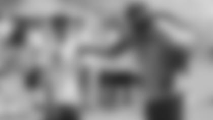 Former Cardinals WR Roy Green works with a high school wide receiver.