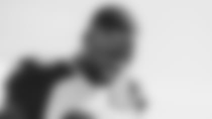 Cornerback Patrick Peterson smiles as he walks out to practice Friday.