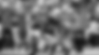 Linebacker Zaven Collins races for a touchdown on a 30-yard interception return Sunday.