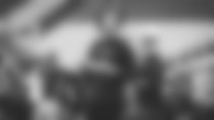 Coach Kliff Kingsbury runs his offense at training camp.