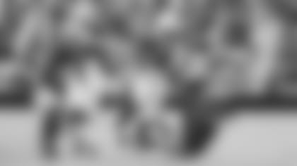 Running back Eno Benjamin runs over 49ers cornerback Dre Kirkpatrick during his 21-yard touchdown run Sunday in the Cardinals' win.