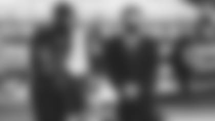 Owner Michael Bidwill (right) stands with S Budda Baker before a game in 2020.