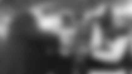 Cardinals owner Bill Bidwill (left) takes the NFC Championship trophy in 2008 from Bertrand Berry as Karlos Dansby, Calais Campbell and Darnell Dockett celebrate behind them.