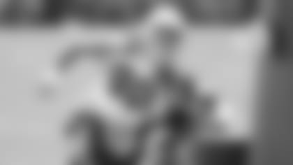 New Cardinals outside linebacker Cassius Marsh goes through a drill during Monday's practice.