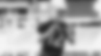 Quarterback Colt McCoy goes through a drill during a recent training camp practice.