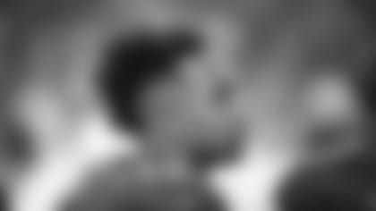 Wide receiver Christian Kirk stands on the sideline during the Cardinals' first preseason game this season.