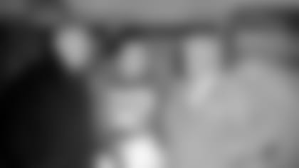 Former Cardinals owner Charles Bidwill (left), Charley Trippi (center) and coach Jimmy Conzelman talk in the locker room soon after Trippi signed with the Cards in 1947.