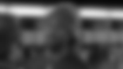 DE Markus Golden speaks with the media on Monday.