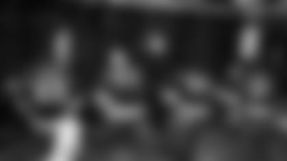 Four of the five offensive line starters -- Rashaad Coward, Billy Price, Lecitus Smith and Kelvin Beachum -- take a moment in the locker room prior to Monday night's game in Mexico City.