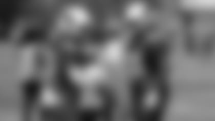 Fullbacks Derrick Coleman (left) and Elijhaa Penny work during a recent OTA.