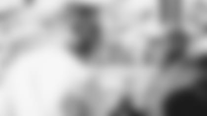 Coach Kliff Kingsbury and GM Steve Keim celebrate a win in Jacksonville last season.