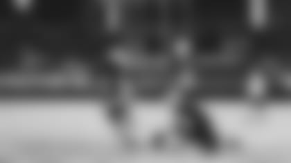 Kicker Matt Prater takes a field-goal attempt in Monday's practice with his special "skinny" goalposts in front of the regular uprights.