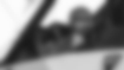 Linebacker Dennis Gardeck is ready for his flight in an F-16 fighter jet on Tuesday during a player visit to Luke Air Force Base.