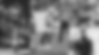 Some of the top topics for the Cardinals for training camp (clockwise from top left): rookie linebacker Isaiah Simmons, quarterback Kyler Murray, wide receiver DeAndre Hopkins, rookie lineman Josh Jones with his mask, cornerback Patrick Peterson.