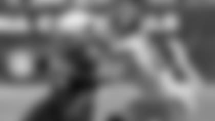 Safety Darian Thompson, here tackling former Cardinals running back Kerwynn Williams in a 2017 game, signed with the Cardinals' practice squad Tuesday.