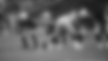 Rookie Lecitus Smith (54) filled in at right guard Sunday on the offensive line alongside center Billy Price (53) and Cody Ford (72).