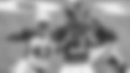 Then-Giants QB Colt McCoy, the newest Cardinal, waits in the pocket during a game last season while Cardinals linebacker Haason Reddick (43) closes in.