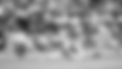 Wide receiver Michael Crabtree runs after the catch against the Panthers on Sunday.