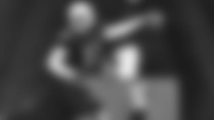 Wide receiver Larry Fitzgerald smiles after a catch during Thursday's practice.