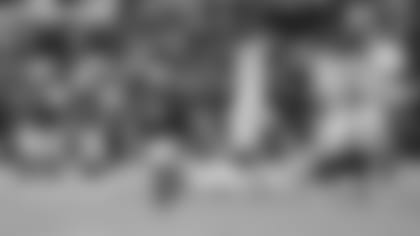 The Cardinals walk off the field after the Raiders kicked the game-winning field goal Sunday.