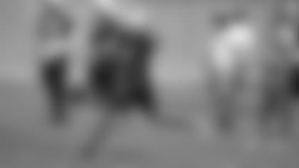 Punter Andy Lee gets off a kick Thursday during the final minicamp practice of 2018.